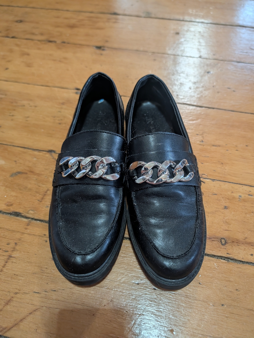 Classic Black Leather Chain-Accent Loafers